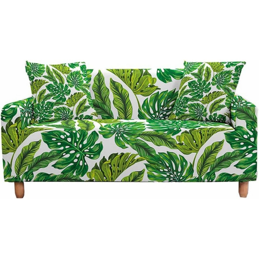 Copridivano verde e bianco con foglie tropicali