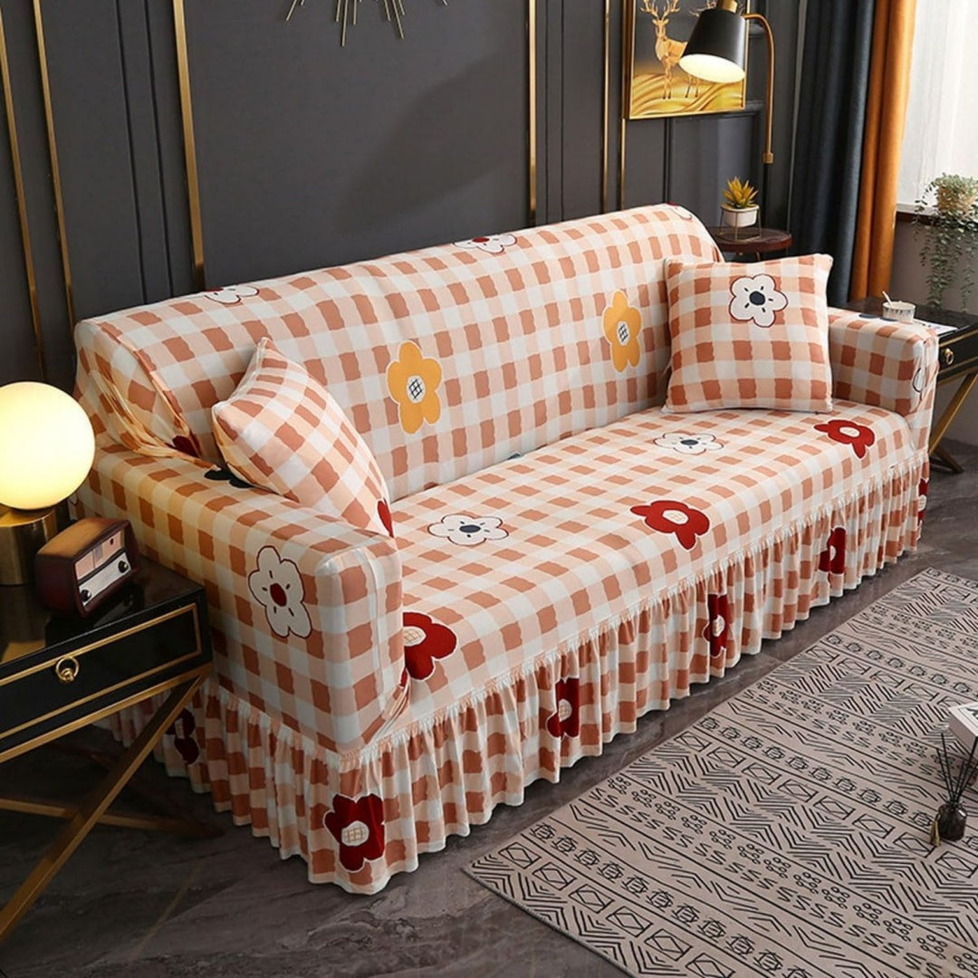 Copridivano beige con motivo floreale arancione
