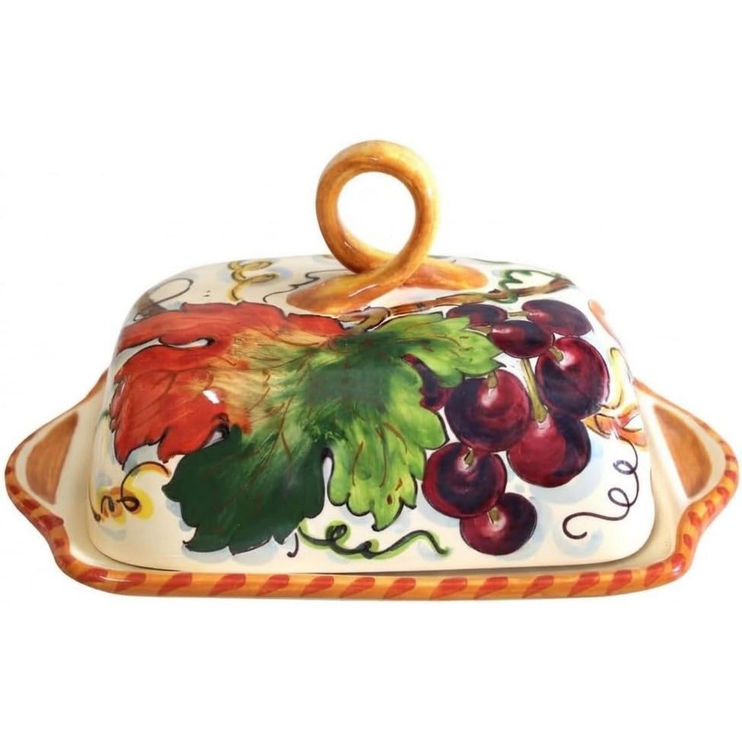 Contenitore in ceramica con coperchio e frutta multicolore
