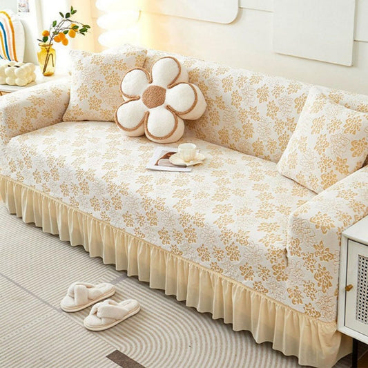 Copridivano crema con motivo floreale giallo
